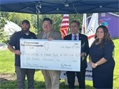 mayor craig receives check from Rep. Krishnamoorthi