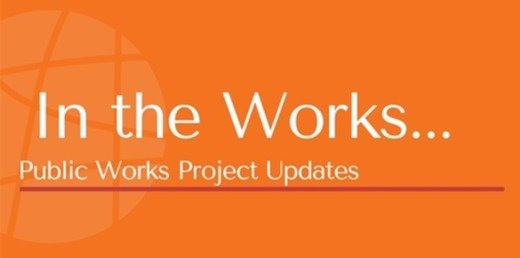 In the Works... Public Works Project Updates orange background with orange globe.