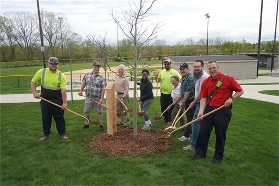 2026 Arbor day group photo around a freshly planted tree 