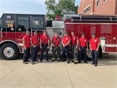 Fire Department in Red shirt supporting Remember Everyone Deployed campaign